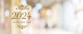 Happy New Year 2024 on blur abstract bokeh background with copybspace for text, new year greeting card, banner