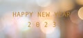 Happy New Year 2023 on blur abstract bokeh background, new year greeting card, banner Royalty Free Stock Photo