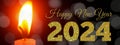 Happy New Year 2024 Bokeh Light And Candle Golden Shiny Text On Night Background. Royalty Free Stock Photo