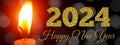 Happy New Year 2024 Bokeh Light And Candle light On Night Background. Royalty Free Stock Photo