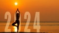 Happy new year card 2024. Silhouette lifestyle woman yoga practicing yoga standing as part of Number 2024 Royalty Free Stock Photo