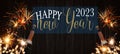 HAPPY NEW YEAR 2023 celebration Silvester New Year`s Eve Party background banner greeting card - Champagne bottles with fireworks Royalty Free Stock Photo