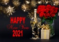 Happy New Year 2021 Champagne gift red flowers golden fireworks Royalty Free Stock Photo