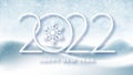 Happy New Year 2022 and Christmas background. Blue winter sky with falling snow and huge snowdrifts. Winter landscape, holiday Royalty Free Stock Photo