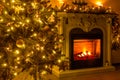 Happy new year and christmas. A cozy room where a fireplace burn Royalty Free Stock Photo