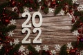 2022 Happy New Year and Christmas decoration on wooden background Royalty Free Stock Photo