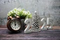 Happy New Year 2025 and Christmas Holiday Decoration on wooden background