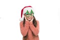 Happy about new year. Christmas holiday. Small girl in santa hat. Happy child christmas tree eyewear accessory booth