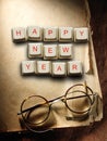 Happy New Year - Christmas made of computer keys and glasses, background
