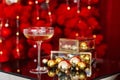 Happy New Year 2021. Christmas and New Year holidays red minimal background, winter season. A glass of champagne against a Royalty Free Stock Photo