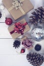 Happy new Year 2020 christmastime. Gift boxes and christmas tree toys on background. Winter light rustic photo Royalty Free Stock Photo