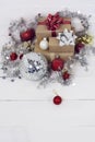 Happy new Year 2020 christmastime. Gift boxes and christmas tree toys on background. Winter light rustic photo Royalty Free Stock Photo