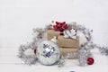 Happy new Year 2020 christmastime. Gift boxes and christmas tree toys on background. Winter light rustic photo Royalty Free Stock Photo