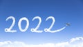 Happy New year 2022 concept. cloud drawing by airplane in sky Royalty Free Stock Photo