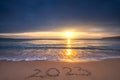 Happy New Year 2023 sea sunrise on the beach shore concept Royalty Free Stock Photo