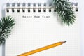 Happy New Year concept, Notebook and yellow pencil Royalty Free Stock Photo