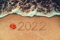 Happy New Year 2022 concept on the sea beach; sunrsie shot Royalty Free Stock Photo