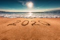 Happy New Year 2020 concept on the sea beach; sunrsie shot Royalty Free Stock Photo