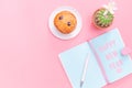 Happy New Year concept, workspace desk styled design office supplies and cactus on pink pastel background minimal style