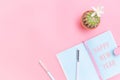 Happy New Year concept, workspace desk styled design office supplies and cactus on pink pastel background minimal style