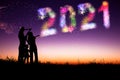 Happy new year 2021 concepts. family watching fireworks and celebrating new year hoilday on the hill