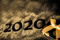 Happy New Year 2020 . Creative Collage of numbers two and zero made up the year 2020. Beautiful sparkling Golden number 2020 and Royalty Free Stock Photo