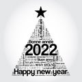 2022 Happy New Year in different languages, celebration word cloud greeting card in the shape of a christmas tree Royalty Free Stock Photo