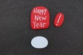 Happy New Year with an empty white stone for a future postcard Royalty Free Stock Photo