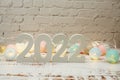 Happy New Year 2022 festive background with space on wooden background Royalty Free Stock Photo