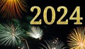 Happy New Year 2024 Firework Night Sky Background. Fireworks Banner And Golden Glitter Shiny Typography Text. Royalty Free Stock Photo