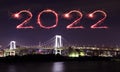 2022 Happy new year firework Sparkle over Rainbow bridge at night, tokyo cityscape, Japan Royalty Free Stock Photo