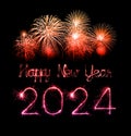 2024 happy new year fireworks celebration written sparkling at night Royalty Free Stock Photo