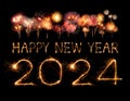 2024 happy new year fireworks celebration written sparkling at night Royalty Free Stock Photo