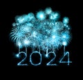 2024 happy new year fireworks celebration written sparkling at night Royalty Free Stock Photo