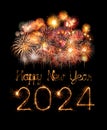 2024 happy new year fireworks celebration written sparkling at night Royalty Free Stock Photo