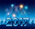 Happy New Year 2017 with fireworks and city in background Royalty Free Stock Photo