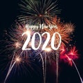 Happy new year 2020 with fireworks on dark background. Royalty Free Stock Photo