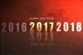 Happy new year 2017 gold shine fonts on red texture background Royalty Free Stock Photo