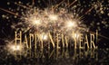 Happy New Year Gold Text with Sparklers Royalty Free Stock Photo