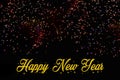 Happy new year with golden letters on black background with colorful lights Royalty Free Stock Photo