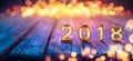 2018 - Happy New Year - Golden Numbers On Defocused Table