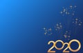 Happy New Year 2020 golden numbers design isolated on blue background with fireworks. Holiday banner, poster, flyer, greeting card