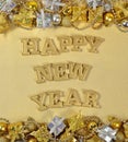 Happy New Year golden text and Christmas decorations Royalty Free Stock Photo