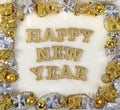 Happy New Year golden text and Christmas decorations on a white Royalty Free Stock Photo