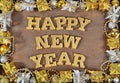 Happy New Year golden text and Christmas decorations Royalty Free Stock Photo