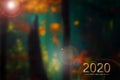 Happy new year on green and yellow bokeh background