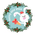 Happy New Year greeting card with a bunny and carrots in a Christmas wreath Royalty Free Stock Photo