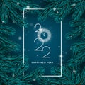 Happy New Year Greeting Card. Christmas tree branches on dark background with white frame and falling snowflakes. Lettering 2022 Royalty Free Stock Photo