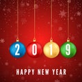 Happy New Year 2019. Greeting card with colorful Christmas balls and white numbers 2019 on them. Snowflakes falling on red Royalty Free Stock Photo