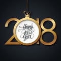 2018 Happy New Year greeting card with handwritten holiday greetings and golden colored christmas ball. Hand drawn lettering. Royalty Free Stock Photo